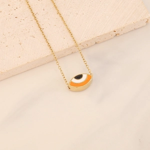 Golden stainless steel necklace with colorful evil eye enamel pendant on stone base