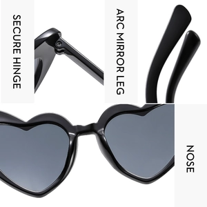 Detail view of rhinestone heart sunglasses featuring secure hinges and curved temple legs