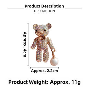 Detail view of teddy bear brooch with colorful rhinestones and size measurements