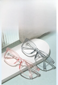 Detail of transparent pink and grey-blue square frames on modern geometric display
