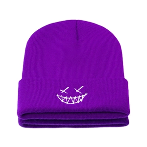 Fashionable purple knitted beanie with white embroidered smiley face on white background