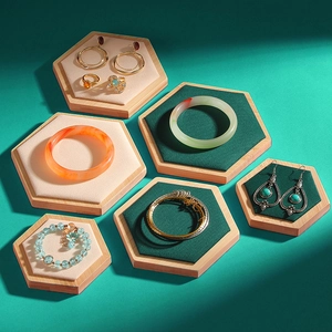 Three-piece hexagonal bamboo wood jewelry display trays with velvet lining for rings and bracelets
