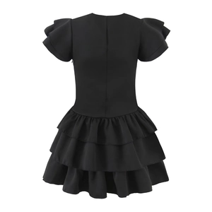 Black tiered mini dress with ruffle butterfly sleeves and a layered cake skirt back view