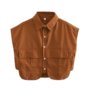 Women's cropped sleeveless shirt with lapel collar, utility pockets, and contrast buttons