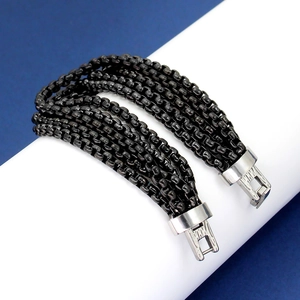 Multi-strand chunky gunmetal chain bracelet with a polished silver-tone clasp