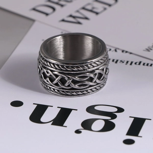 Men's vintage punk titanium steel ring with intricate woven metal texture design