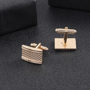 Classic square gold cufflinks for men featuring an intricate engraved grid texture pattern