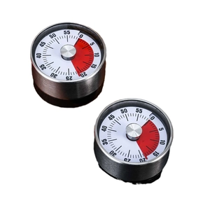 Mechanical kitchen timer with silver metal casing and red visual dial on black background