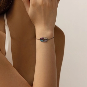 S925 sterling silver punk star bracelet with colorful gemstones worn on a wrist