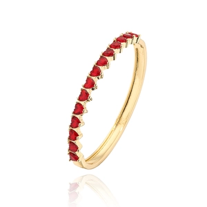 Detail of 18K gold-plated bangle featuring micro-set red heart-shaped zircon stones