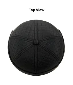 Top view of black quilted docker cap with diamond stitch pattern and metal logo detail