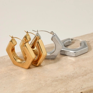 Minimalist hollow geometric hexagon hoop earrings in polished gold and silver steel finish