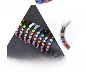 Detail showing 8-piece set of square colorful stone and black lava rock beaded bracelets