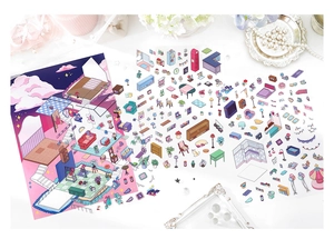 Macro detail of aesthetic room scene stickers and background paper on a white desk