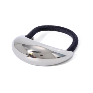 Polished silver half-moon metal hair cuff with elastic black tie on white background
