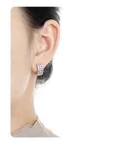 Detailed view of S925 sterling silver honeycomb earrings with micro-inlaid cubic zirconia
