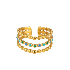 Detailed close-up of a three-layer gold plated ring with blue and green beads decoration
