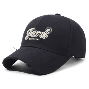 Distressed black baseball cap with JARD SINCE 1987 embroidery and vintage frayed brim