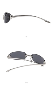 Side and back view of Y2K star rimless sunglasses with silver metal temples and grey lenses