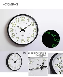 Close-up of the 12-inch metal black clock with luminous numbers in day and night modes