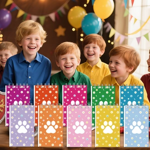 Colorful paw print notebooks displayed at a vibrant children's birthday party setting
