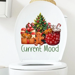Christmas tree and gingerbread man waterproof wall stickers applied on white toilet lid