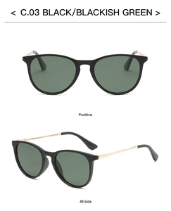 Detail of oval kids sunglasses in black with gold metal arms and green lenses
