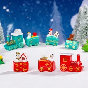 Miniature Christmas train set with snowman and polar bear figures for holiday DIY snow decor