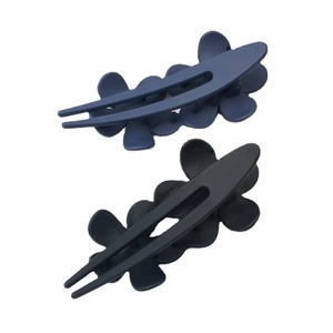 Matte floral U-shaped hair clips in black and navy blue on a white background
