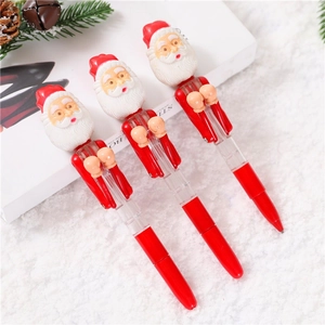 Three cute Santa Claus pens on snowy background for Christmas decorations and gifts