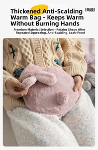 Detailed view of a soft pink rabbit faux fur hot water bottle with cute 3D ears and tail