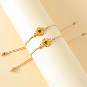 Detail of sunflower charm bracelets with yellow oil drip alloy and adjustable wax rope