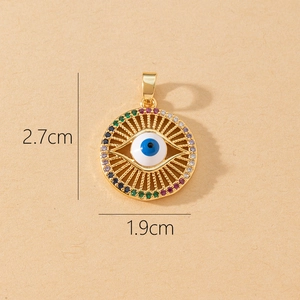 Detail of evil eye pendant with blue enamel and colorful cubic zirconia stones, 2.7cm high