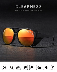 Dettaglio degli occhiali da ciclismo stile Pit Viper nero opaco con lenti specchiate arancio