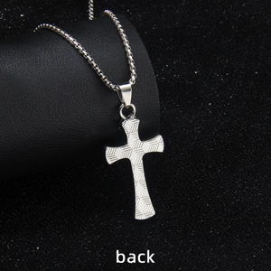 Back view of silver stainless steel cross necklace with textured weave pattern design