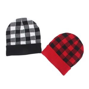 Plaid knitted beanies in black-white and red-black checkered patterns with cuffed brims