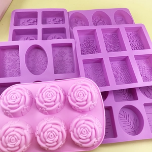 Purple silicone mold for square flower soap making with multiple geometric patterns