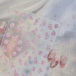 Floral nail stickers with pink roses, golden edges and iridescent aurora finish effects