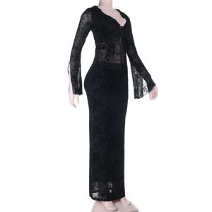 Detail of black lace two-piece set featuring delicate floral textures and ribbed knit trim