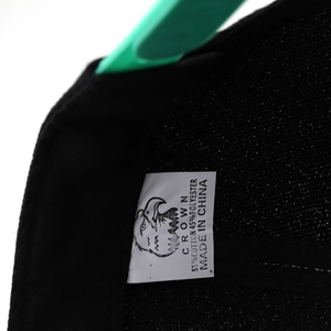 Detail view of cotton blend cap interior with Crown brand label and washing instructions