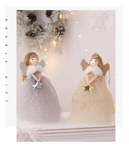 Detail of grey and gold Christmas angel dolls with mesh skirts and glitter wings