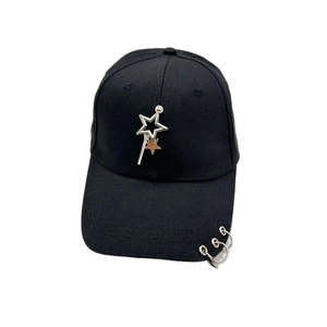 Detail of black cotton baseball cap with silver metal star pendant and ring accents
