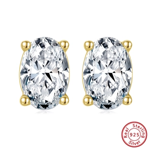 Detailed view of oval zircon stud earrings in S925 sterling silver with a 4-claw setting