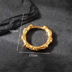 Gold bamboo hoop earrings in vintage titanium steel shown with 1.69cm height dimensions