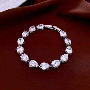 Luxurious silver water drop zircon bracelet featuring 14 pear-cut stones and claw settings