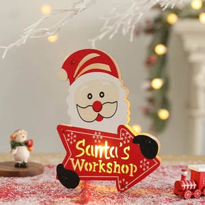 Lighted wooden Santa Claus workshop sign with LED warm glow for Christmas decor