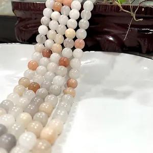 Polished natural tiger eye and sunstone round beads for jewelry making projects