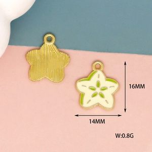 Macro view of 16mm gold starfish pendant with green enamel and technical dimensions