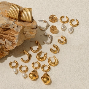 Luxe gold and silver stainless steel earrings collection featuring pearls and crystals
