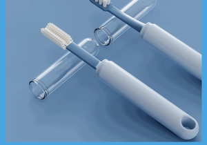 Detailed view of dual-sided silicone pet toothbrushes with protective storage cases